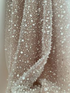 Wedding Dress With Pearl Embroidery In Tulle, Wedding Dress With Pearl Embroidery And Tulle, Floor-length Organza Tulle For Wedding, Champagne Wedding Gown With Sparkling Details, Glamorous Tulle Fabric For Wedding, Glamorous Wedding Tulle Fabric, Glamorous Sheer Wedding Gown, Glamorous Organza Sequin Fabric For Wedding, Champagne Sequin Fabric For Wedding