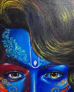 a painting of a woman's face painted in blue and orange colors with her hair pulled back