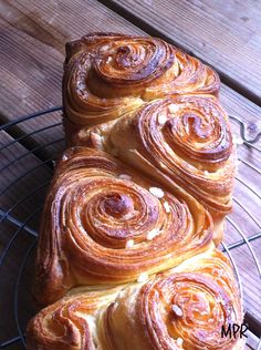 some very tasty looking pastries on a wire rack