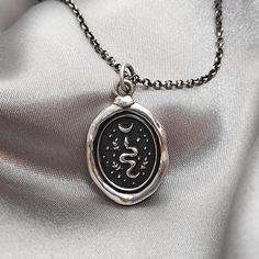 "Snake Celestial Moon Wax Seal Necklace Pendant, Handmade Sterling Silver, Intaglio Seal Heirloom Original Design by LT In all mythological language, the snake is an emblem of immortality. The snake is associated with the Moon because of its ability to change or renew its skin, which is similar to the Moon's waxing and waning. Both are symbols of renewal and change. >>Size: 21 mm excluding bail >>Material: Solid Sterling Silver >>Pendant Only Option: You may order \"Pendant Onl Seal Necklace, Wax Seal Necklace, Silver Work, Fancy Jewelry, Wax Seal, Birthday Boy, Recycled Sterling Silver, Wax Seals, Handmade Sterling Silver