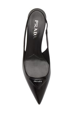 A pointy toe and sculptural kitten heel frame this slingback pump crafted of patent calfskin and finished with a puffy take on Prada's iconic triangle logo. 2" (55mm) heel Elasticized slingback strap Leather upper and lining/leather and rubber sole Imported Designer Shoes Prada Slingback, Triangle Logo, Slingback Pump, Kitten Heel, Women's Pumps, Designer Shoes, Calf Skin, Rubber Sole, Leather Straps