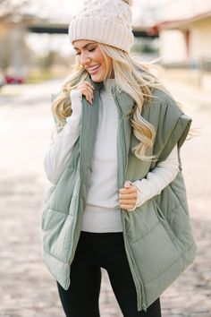 Ok, but we are absolutely in love with this oversized puffer vest! It's so edgy and super cozy! We think this vest will look great over a sleek top and leggings or even over a cozy pullover and jeans for those really cold days! Collared neckline Zip front closure Pockets Quilted puffer style Oversized fit No stretch Baileigh is wearing the small/medium. Green Puffer Vest Outfit, Oversized Puffer Vest, Green Puffer Vest, Puffer Vest Outfit, Puffer Style, Oversized Puffer, Cute Spring Outfits, Cozy Pullover, Quilted Vest