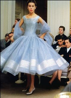 Dior house model Odile wearing a shimmering dress called ‘Zépherine’ from the Dior autumn/winter collection, Paris, 1954~ Photo by Mark Shaw. See our entire collection of Stoles at http://www.whitestole.com Dior House, Shimmering Dress, Autumn Winter Collection, Shimmer Dress, Dress Autumn