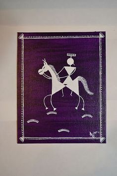 a purple and white painting with a man riding a horse on it's back