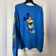 Brand New With Tags! Blue Mickey Mouse Tops For Disney Trips, Fun Blue Long Sleeve T-shirt, Blue Mickey Mouse Tops For Disney Fan Events, Disney Blue Top For Streetwear, Blue Long Sleeve Disney Top, Casual Long Sleeve Tops For Disney Fan Events, Blue Disney Tops For Disney Trips, Blue Disney Style Tops For Disney Trips, Blue Long Sleeve Top With Mickey Mouse