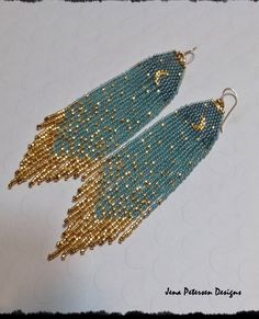 two pairs of blue and gold beaded earrings