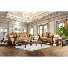 a living room filled with furniture and a chandelier