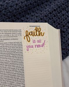 an open book with the words faith is all you need