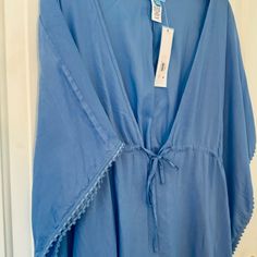 Nwt Draper James Rsvp Sz Small Caftan With Batwings In Iris Retail Price $68 - Full Coverage - Smooth Knit Construction - Straight Hem - No Closure - Pull-On Styling - Batwing Sleeves, Short Sleeves - Partially Lined - V-Neck - Fresh From The Reese Witherspoon Collection, Draper James Rsvp Caftan Coverup - Light Blue, Perfect For Complementing Your Swimwear - Size Small The Ideal Throw-On For Beach Days Or Poolside Relaxation - Made From 100% Modal, Ensuring A Soft And Airy Feel Bohemian Blue Sleepwear For Spring, Blue Summer Sleepwear With Kimono Sleeves, Blue Sleepwear With Kimono Sleeves For Summer, Blue Kimono For Daywear In Spring, Blue Spring Kimono For Daywear, Blue Kimono For Spring Daywear, Blue Bohemian Sleepwear For Vacation, Blue V-neck Sleepwear For Vacation, Bohemian Blue Sleepwear For Vacation