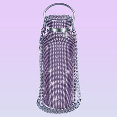 a purple bag with chains hanging from it's sides and a chain around the bottom