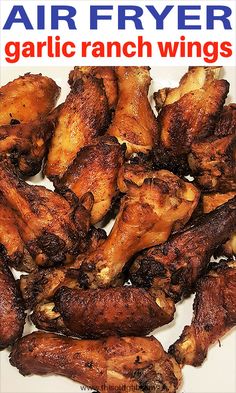 there is a white plate with chicken wings on it and the words air fryer garlic ranch wings