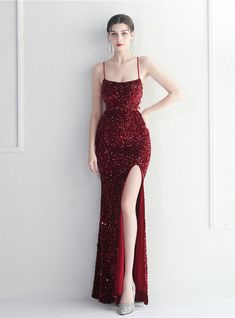 Traverse through the night in this burgundyen mermaid silhouette gown, a vision of celestial beauty. The spaghetti straps descend into a charming back adorned with crossed straps, a nod to enigmatic elegance. With each step, the high slit narrates a story of audacity, while the sequins twinkle like stars amidst a dark sky. Descend onto the scene as the muse of elegance, the epitome of mystical allure. Sequin Fashion, Cocktail Prom Dress, Nightclub Dress, Sequin Prom Dress, Evening Gown Dresses, Fishtail Dress, Fish Tail, Split Dress, Maxi Dress Evening