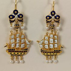 Museum copy caravel shaped earrings made of 18 ct. solid yellow gold decorated with colorful handmade hot enamel and pearls, made in Greece in Athens Each earring is made of 33 different pieces, as you can see in the photo, most of the pieces are different between the left and the right earring It' s a perfect reproduction of an antic pair of earrings The original is exposed at the Benaki museum in Athens and belongs to the most famous and discussed jewelry in Greece Post - Byzantine and modern Luxury Enamel Earrings For Gift, Luxury Yellow Gold Enamel Earrings, Luxury Handmade Yellow Gold Pearl Earrings, Formal Drop Earrings In Enamel, Formal Enamel Earrings Hallmarked, Formal Enamel Drop Earrings, Luxury White Enamel Earrings, Luxury Hallmarked Enamel Earrings, Traditional Yellow Gold Enamel Earrings