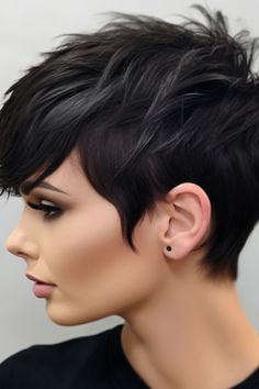 Step into the spotlight with a jet-black pixie adorned with feathered layers. The choppy layers add a touch to your short hairdo. Click here to check out more gorgeous short dark hair color ideas. Short Dark Hair, Long Hairstyle, Beauty Hairstyles, Short Sassy Hair, Edgy Short Hair, Short Hair Haircuts, Hair Color Dark