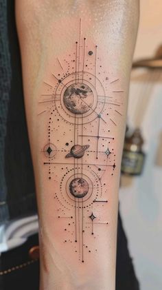 an arm tattoo with different planets and stars on the back of it, in black ink