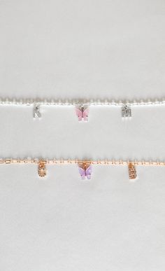 "A dainty personalized necklace featuring a colorful butterfly charm in between two crystal initials. Choose from peachy pink, turquoise blue, fuchsia pink, yellow, lavender, white, emerald green, ruby red, royal blue, jet black, and charcoal. Matching earrings: https://www.etsy.com/listing/693774042/colored-mariposa-butterfly-earrings-18k ✧ 1 gold plated necklace ✧ chain: 4mm curb (picture 2 & 5) or 3mm rolo (picture 1 & 4) ✧ lobster clasp closure ✧ nickel + lead free ✧ length: 16\"/40. Dainty Charm Necklaces With Letter Beads For Personalized Gift, Dainty Letter Beads Charm Necklace For Personalized Gift, Pink Personalized Dangle Necklaces, Pink Dainty Jewelry For Personalized Gifts, Dainty Pink Jewelry For Personalized Gift, Personalized Pink Necklace, Trendy Pink Butterfly Necklace Gift, Trendy Pink Butterfly Necklace For Gift, Delicate Personalized Pink Jewelry