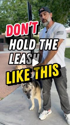 a man standing next to a dog on top of a cement slab with the words, don't hold the leash like this