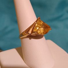 14k Yellow Gold Fancy Kite Shaped Golden Citrine Ring, 2.68ctw. A Bit Of Sunshine On Your Hand! Unused, Excellent Condition. Total Ring Weight Is 4.6 Grams. Citrine Is November's Beautiful Birthstone. Gem Lore: Throughout History, Citrines Have Been Valued For Their Beauty And Brilliance. They Remind Us Of The Bright, Warm Sun And The Vitality Of Life. Their Vibrant Yellow Color And Shining Clarity Often Represent A Healthy Mind And Body As Well As Happiness And Success. Formal Yellow Solitaire Jewelry, Fine Jewelry Yellow Gold Trillion Cut Sapphire Ring, Yellow Gold Diamond Cut Topaz Ring, Trillion Cut Yellow Gold Sapphire Ring, Trillion Cut Sapphire Ring In 14k Yellow Gold, 14k Gold Yellow Rings With Accent Stones, Pear-shaped Yellow Gold Topaz Ring, Yellow Gold Solitaire Citrine Jewelry, Yellow Topaz Solitaire Ring In Citrine