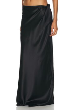 Find SAINT LAURENT Satin Maxi Skirt In Black on Editorialist. Saint Laurent Satin Maxi Skirt in Black 100% silk. Made in Italy. Dry clean only. Unlined. Draped satin waist tie closure. Satin fabric. Item not sold as set. SLAU-WQ92. 783897-Y6H40-1000. About the designer: SAINT LAURENT has been influencing and revolutionizing the fashion industry since the debut of its iconic ‘Rive Gauche’ collection in 1966 - the couture house was the first to create a ready-to-wear capsule. The sleek, precisely tailored staples, like the signature biker jackets, transcend seasons and trends. Creative Director Anthony Vaccarello continues to honor the label’s illustrious reputation by reintroducing cult styles, including the ‘Lou’ handbag and ‘Tribute’ sandals. Silk Lined Skirt For Night Out, Full Length Silk Lined Skirt, Full-length Silk Lined Skirt, Luxury Silk Skirt For Formal Occasions, Full-length Silk Skirt With Lining, Fitted Black Silk Skirt, Luxury Silk Formal Skirt, Black Fitted Silk Skirt, Chic Black Silk Skirt