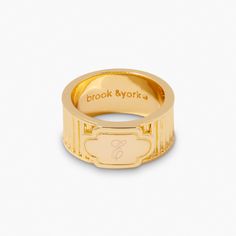 Add a unique, edgy touch to your ensemble with Harlow—a one-of-a-kind gold ring, custom to your exact specifications! Let your style shine and give your look a high-fashion edge. Available in 14k gold plated brass Size: 1/2" Band Width: 10mm Protected with an anti-tarnish barrier With engraving this item is FINAL SALE SKU: BYR1119 Classic Gold Stackable Brass Rings, Adjustable Gold Wide Band Ring, Elegant Gold Engraved Ring In Brass, Gold Rings With Polished Edges And Wide Band, Gold Luxury Engraved Ring, Gold Engraved Open Band Ring With Polished Finish, Adjustable Gold Engraved Ring For Formal Occasions, Adjustable Gold Wide Band Ring, Tarnish Resistant, Classic Gold Initial Ring With Open Band