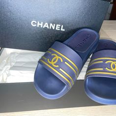 Chanel " Sun Deck " Cc Logo Pool Slides For True Chanel Lovers Only!!! Style G34355 X52931 Women's Size 36 Navy & Gold Worn Twice - In Excellent Condition! Perfect Slides By Chanel!!! Very Light And Comfortable!!! Contrast Cc Logo Rubber Upper Rubber Sole Made In Italy Italian Sizing Please Note That Shoes Do Not Come In Half Sizes And Run Slightly Small As Most Chanel Shoes Sun Deck, Chanel Lover, Navy Gold, Cc Logo, Chanel Shoes, Pool Slides, Blue Gold, Women's Shoes Sandals, Rubber Sole