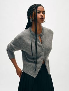 An integral part of every modern wardrobe, this cardigan is crafted from merino wool infused with cashmere for added softness. An array of considered details include a crew neckline, tonal buttons, and ribbed trims. A relaxed fit allows for easy layering over shirts and tees alike. Details Relaxed fit. Long sleeve. Length in size small is 21". The model is 5'10 1/2" and is wearing a size small. 70% Wool, 30% Cashmere. Dry clean only. Style #20982 Everyday Cashmere Cardigan With Buttons, Everyday Cashmere Cardigan, Cashmere Crew Neck Sweater With Button Closure, Cashmere Crew Neck Sweater With Buttons, Crew Neck Cashmere Sweater With Button Closure, Crew Neck Cashmere Sweater With Buttons, Cashmere Button Sweater For Layering, Cashmere Sweater With Buttons For Layering, Wool Cardigan With Button Cuffs For Layering