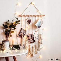 a white table topped with pictures and lights