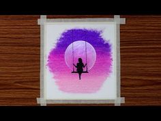 a person sitting on a swing in front of a pink and purple background with the moon