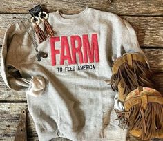 Check out this item in my Etsy shop https://www.etsy.com/listing/1421290872/farm-to-feed-america-sweatshirt-farmers America Sweatshirt, Gift For Farmer, Farm Tees, Farmers Wife, Western Wear Outfits, Cute Country Outfits, Wife Gifts, Farmer Wife, Feeding America