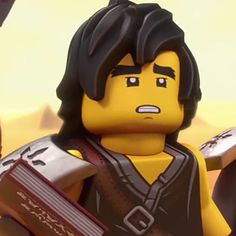 the lego movie character is holding a book in his hand and looking at something off to the side