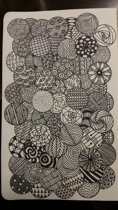 a black and white drawing on paper with lots of different things in the middle of it