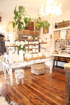 the inside of a store with wooden floors