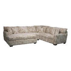 a large sectional couch sitting on top of a white floor