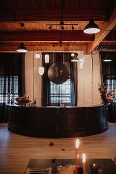 an empty restaurant with candles and decorations