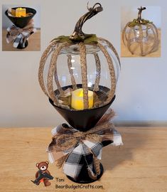 an arrangement of pumpkins with candles in them on top of a wooden table next to other decorations