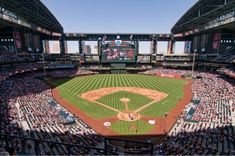 a baseball stadium filled with lots of people