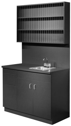 a black cabinet with a sink and cupboards on the wall next to each other