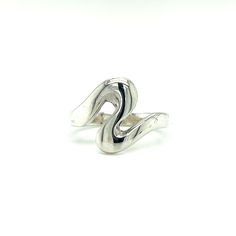 A trendy Super Silver Funky Squiggle Ring with a modern wave design and a satin appearance. Adjustable Bypass Ring With Modern Twist, Modern Twist Adjustable Bypass Ring, Adjustable Silver Wavy Rings, Modern Twist Open Band Rings, Modern Twist White Gold Bypass Ring, Wavy Silver Promise Ring, Elegant Silver Swirl Ring, Elegant Silver Spiral Bypass Ring, Adjustable Wavy Rings With A Modern Twist