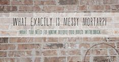 a brick wall with a sign that says what exactly is messy mortar?