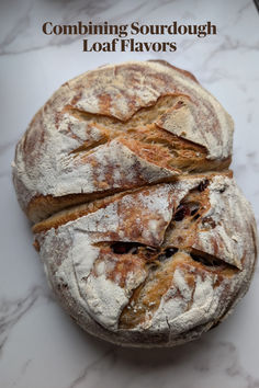 a loaf of sourdough sitting on top of a white marble counter with the words combining sourdough loaf flavors