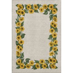 a rug with sunflowers on it and leaves around the edges, in front of a white background