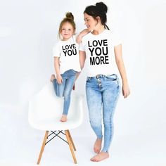 Introducing our Mom & Daughter Collection – a perfect blend of style and family love!  Crafted with soft, breathable fabric, these matching tees boast a timeless design that celebrates the special bond between mothers and daughters. Whether you're twinning with your mini-me or surprising the superwoman in your life, these shirts are a stylish statement of family unity. Elevate your family fashion game with our Mom & Daughter Collection – because love always looks good! Mom And Child, Matching Tshirts, Family Matching Shirts, Cricut Shirts, Mom And Daughter, Family Fashion, Mom Kid, Outfits Fashion