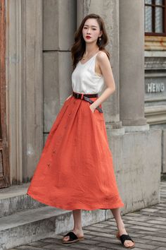 "DETAIL * 100% Linen * Two side pockets * Back elastic waist * Button down skirt * Button front skirt * Below Knee Length * A Line skirt, Midi skirt * Perfect for Spring, Summer and Autumn * Wash by hand or machine with cold water * Model's belt is not sale item * The model is 170 cm (5′ 7″) tall with a 80 cm (31.5\") bust, 66 cm (26\") waist. She is wearing in size XS. CUSTOM MADE SERVICE If you * Change other color * Can't find your size in our size Chart * Change the Style * Change the length Buttoned Maxi Skirt For Spring, Spring Buttoned Maxi Skirt, Chic A-line Skirt With Buttons, Chic Midi Skirt With Buttons, Relaxed Midi Skirt With Buttons, Knee-length Summer Skirt With Button Closure, Summer A-line Skirt With Button Closure, Summer Knee-length Skirt With Button Closure, Relaxed Full Skirt With Buttons