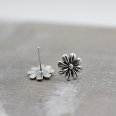 Flower Stud Earrings in sterling silver 10mm sterling silver flower stud earrings finished with sterling silver post and ear nuts. Dainty Silver Flower Earrings For Everyday, Silver Dainty Flower Earrings For Everyday, Sterling Silver Flower Jewelry For Everyday, Everyday Sterling Silver Flower Jewelry, Everyday Silver Hypoallergenic Flower Earrings, Classic Sterling Silver Flower Jewelry, Minimalist Sterling Silver Flower Earrings For Everyday, Sterling Silver Minimalist Flower Earrings, Minimalist Sterling Silver Flower Shaped Earrings