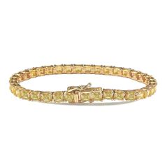 Stunning, timeless and classy assher cut tennis bracelet. This brilliant tennis bracelet is filled with rich, high quality yellow asscher-cut cubic zirconia gemstones, hand set in the trendiest, yet classy, prong setting. Each stone is set in Suzy Levian's signature high polished 925 yellow gold plated sterling silver. Every single bracelet is man made, making it a unique masterpiece. Surprise someone special in your life with this luxurious tennis bracelet. Suzy Levian guarantees the use of onl Levian Jewelry, Gemstone Brooch, Single Bracelet, Cubic Zirconia Bracelet, Cubic Zirconia Jewelry, Cubic Zirconia Earrings, Jewelry Rings Diamond, Zirconia Earrings, Gemstone Necklace Pendant