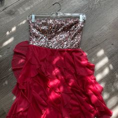 A Beautiful And Stylish Dress For Your Next Special Event! The Sparkles And Sequins Can Make Any Event Even More Fun! Dress Has Only Been Worn Once. Embellished Purple Mini Dress For Prom, Purple Embellished Strapless Dress, Purple Ruffled Mini Dress For Prom, Glamorous Purple Dress For Homecoming, Glamorous Purple Homecoming Dress, Purple Sleeveless Sequin Dress For Prom, Purple Strapless Dress For Party Season, Strapless Purple Dress For Party Season, Purple Sleeveless Sequin Homecoming Dress