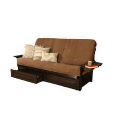 a futon sofa with drawers underneath it