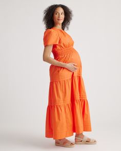 The perfect maxi dress for all stages of pregnancy and beyond! Designed with a smocked waistband for a comfortable, yet flattering fit and functional side seam pockets for life's necessities. Made from 100% organic cotton for lightweight breathability. With a v-neck and short sleeves, this is a must-have for your summer wardrobe.  | Quince | Women's Poplin Maternity Tiered Maxi Dress in Vermilion Red, Size Small, Organic Cotton Red Summer Maternity Dress, Nursing Friendly V-neck Maternity Dress, Maternity Nursing Friendly V-neck Maxi Dress, Cotton V-neck Maternity Dress, Summer Maternity Maxi Dress, Floor-length, Stages Of Pregnancy, Vermilion Red, Pre Pregnancy, Pregnancy Stages