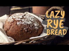 a loaf of lazy rye bread sitting in a basket with the words lazy rye bread