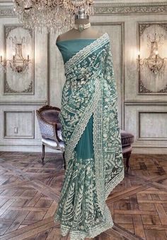 Beautiful turquoise blue net saree with thread, stone and sequins work and running blouse piece Blue Net Saree, Pengantin India, Simple Saree Designs, Indian Sari Dress, Sari Design, Beautiful Casual Dresses, Sari Dress, Simple Sarees, Net Saree